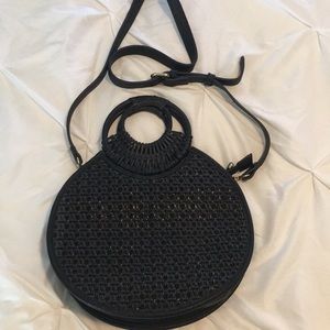 Brand new beautifully detailed round leather crossbody handbag with handles